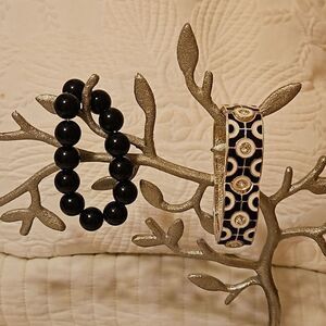 2 bracelets: solid black & geometric print black